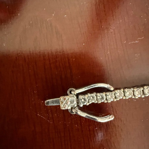 Riviera tennis bracelet used, size 18, silver-plated, gray