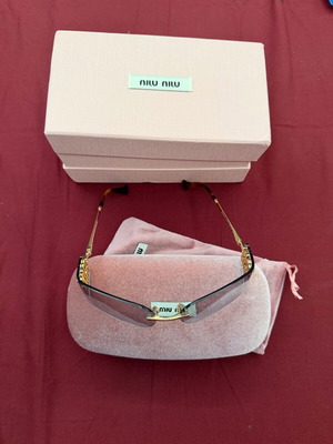 Miu Miu sunglasses used, gold frame with light gray lenses