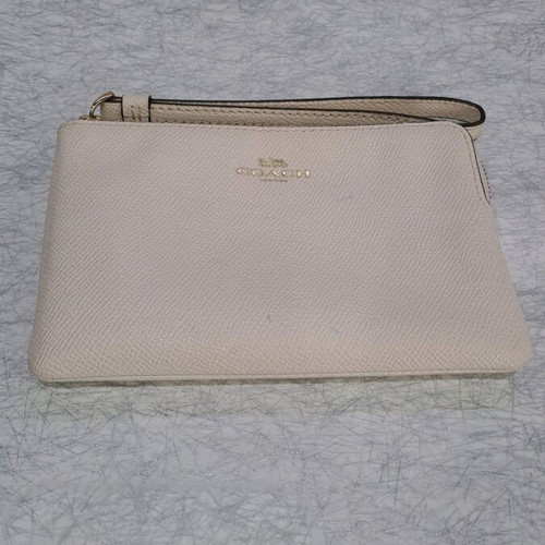 Coach wristlet bag used, beige with strap