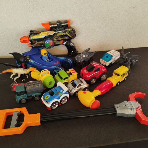 Set of children's action toys and toy cars