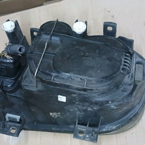 VW Golf 4 right headlight Valeo used, halogen projector lamp