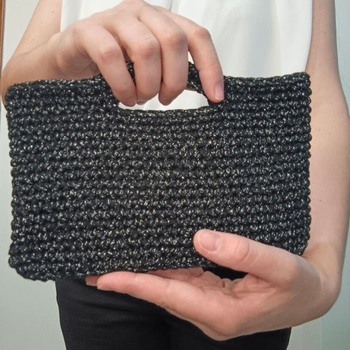 Evening bag handmade knitted with shiny yarn, black