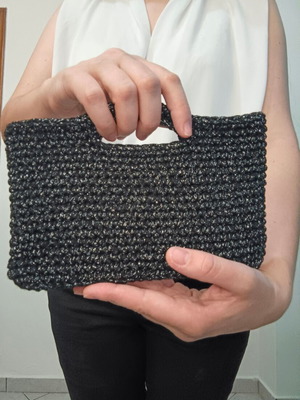Evening bag handmade knitted with shiny yarn, black