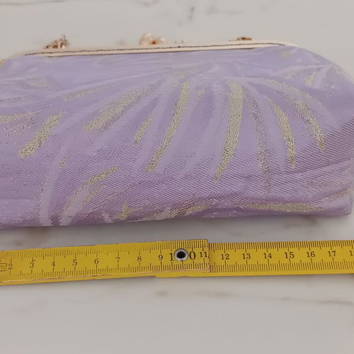 Vintage shoulder bag new in purple and gold shades with floral lining
