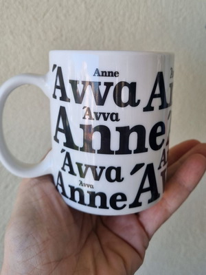 White semi-porcelain mug with the name Anna
