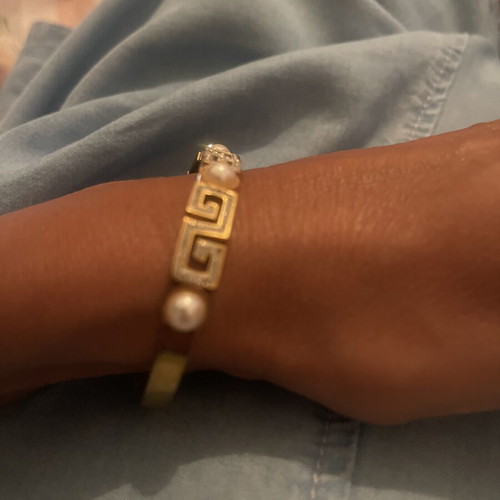 Steel bracelet used, gold color with meander design, crystals and pearls