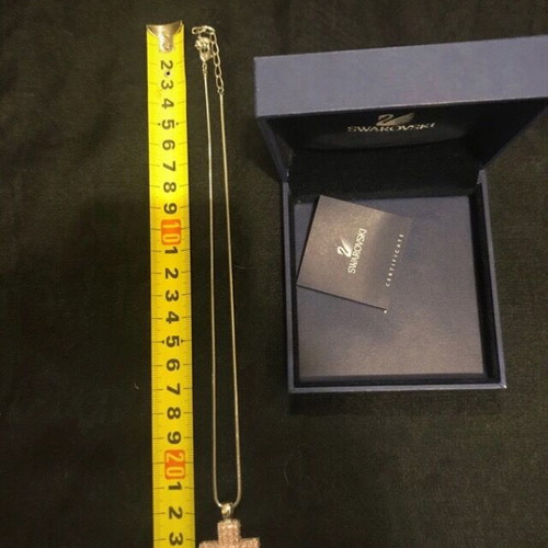 Swarovski pink cross necklace like new with crystals