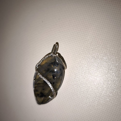 Opal pendant with silver used, snake shape