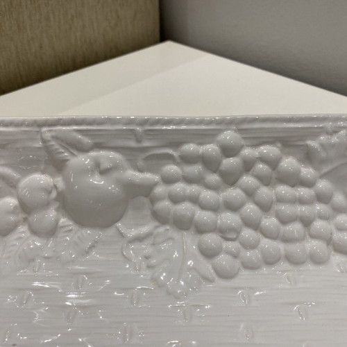 White fruit bowl with embossed designs used