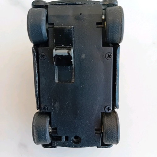 Smart toy car used, metal and plastic, with spark needs repair