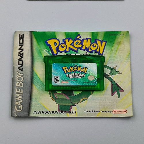 Pokemon Emerald Version for Game Boy Advance used with manual and poster