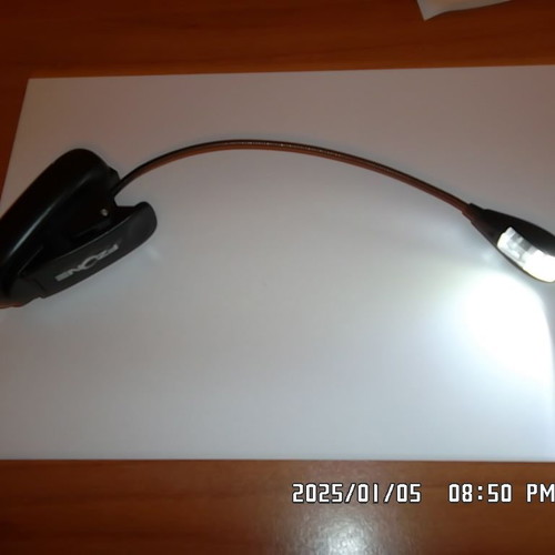 Music stand light with clip like new, 2 steps, battery powered