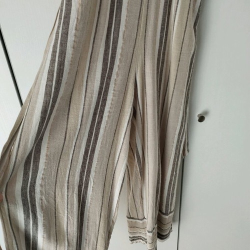 One-piece jumpsuit used, size S, beige
