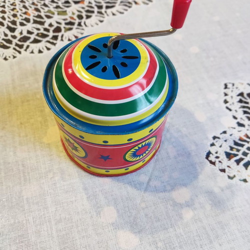 Vintage tin music box with hand crank like new
