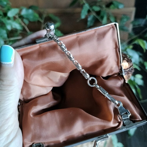 Small shoulder bag with copper sequins and long chain