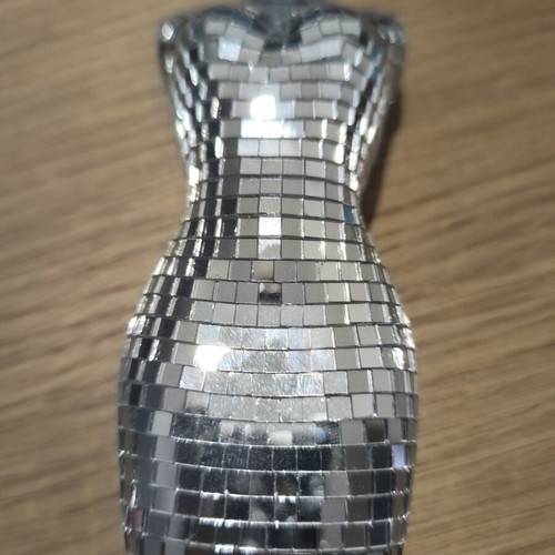 Decorative light reflection sculpture in female body shape like new