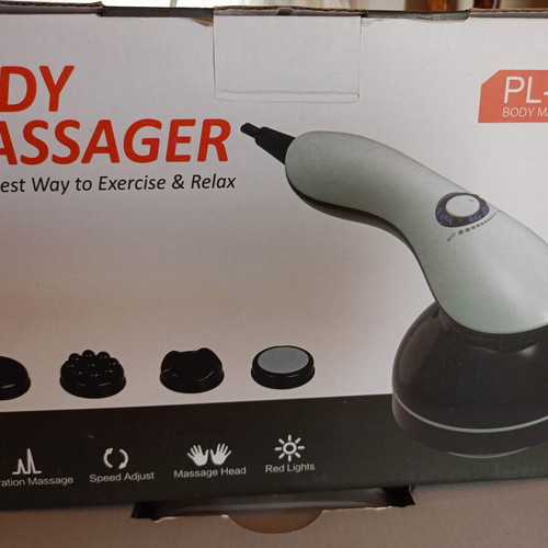 Body Massager new with multiple heads and heel attachment