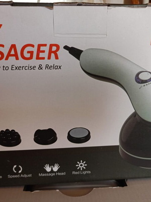 Body Massager new with multiple heads and heel attachment