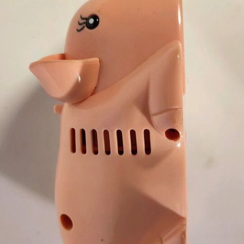 Pig-shaped handheld vacuum cleaner used, functional