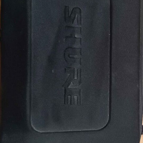 Shure Beta 58a GLXD4 wireless microphone used with case