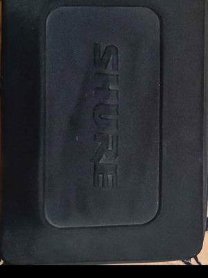 Shure Beta 58a GLXD4 wireless microphone used with case