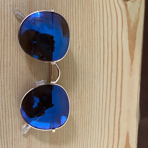 Round sunglasses with blue lens and UV protection