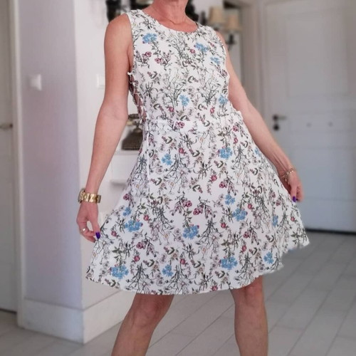 Floral dress white like new, size 42 with side opening
