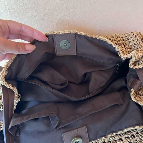Woven boho style beach bag like new with brown leather handles and inner zip pocket