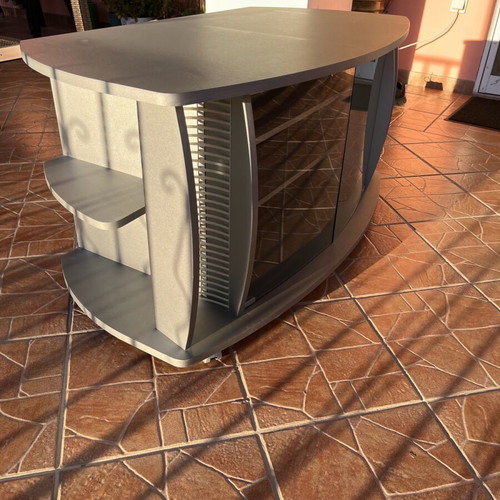 TV stand used with glass doors and rotating base