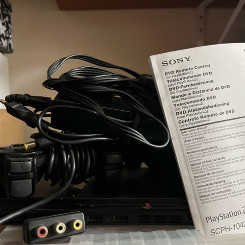 Sony PlayStation 2 used, scratched controllers, excellent box