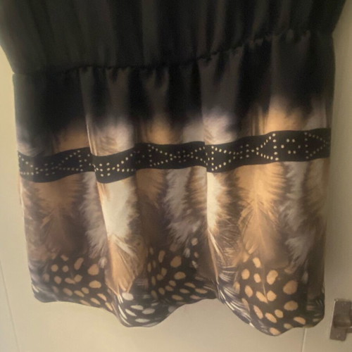 Relish long top new with elastic hem and deep back