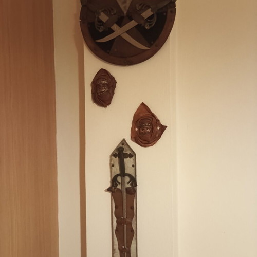 Vintage wall decoration set with swords, shield & leather masks