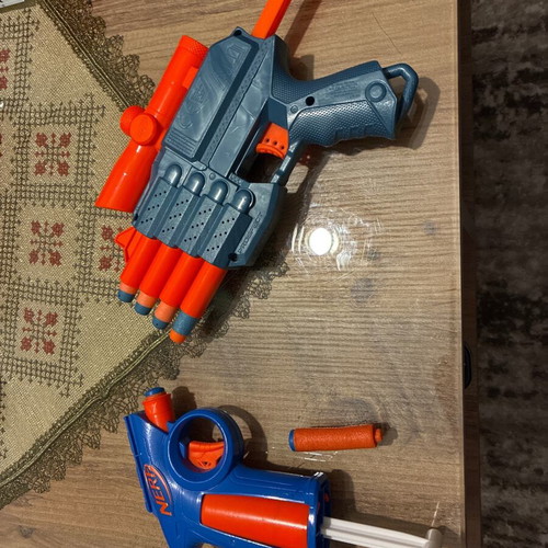 Nerf pistols used, pack with darts