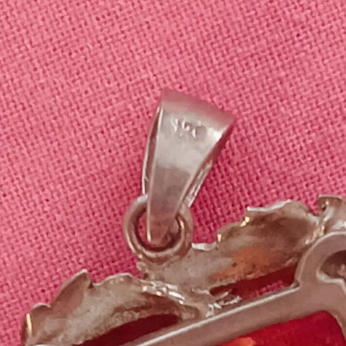 Silver (925) vintage pendant with red/orange amber stone