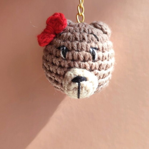 Knitted bear keychain new with red bow brown