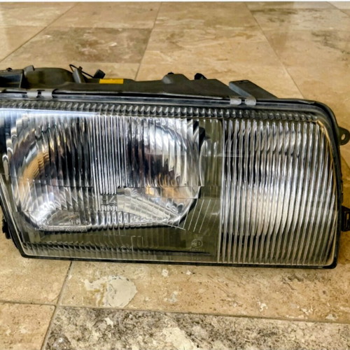 W126 right headlight new, genuine Bosch