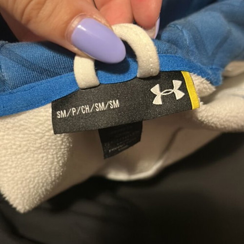 Under Armour hoodie used, fleece lining, pockets, white and blue