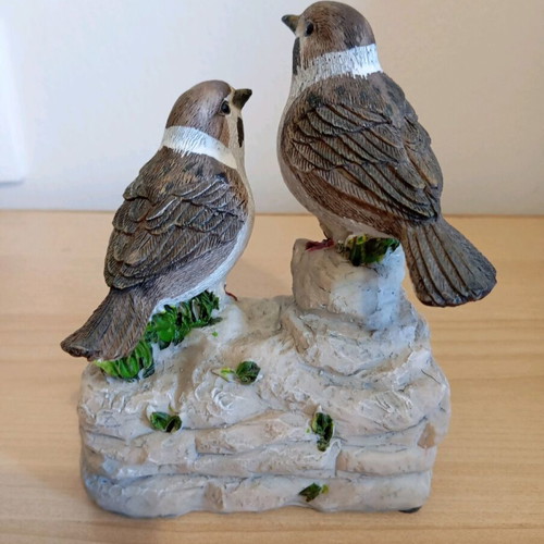Two decorative birds like new