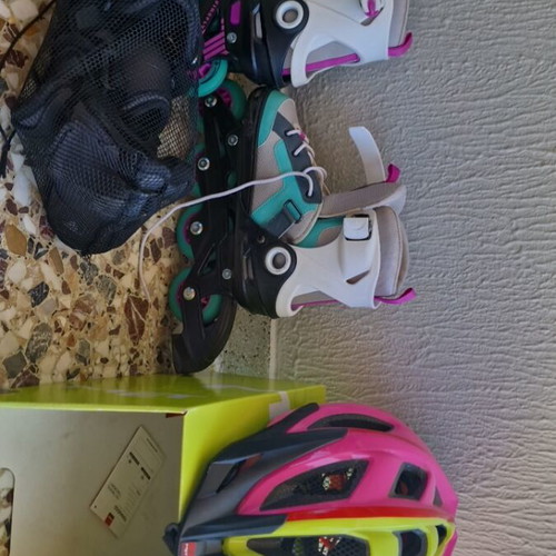 Firefly rollers 33-36 with protective set and helmet, like new