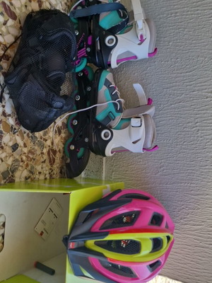 Firefly rollers 33-36 with protective set and helmet, like new
