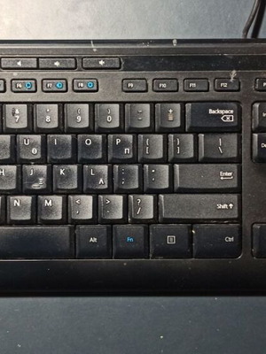 Microsoft computer keyboard used with one missing rear support