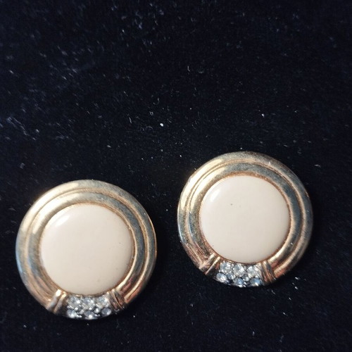 Clip-on earrings used, beige