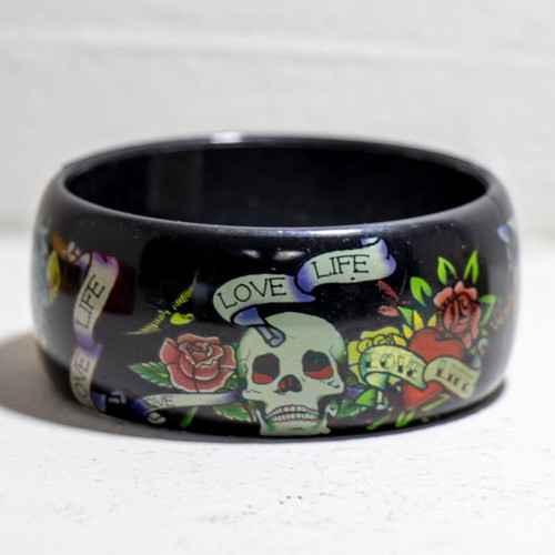 Ed Hardy black acrylic bangle bracelet with “Love Life Skull Rose Dragon” design like new