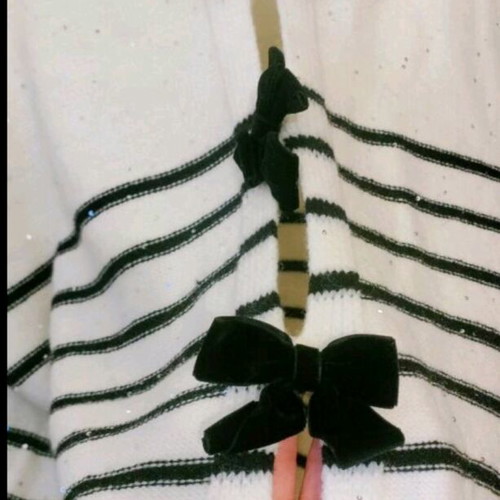 Knitted blouse with bows and silver sequins new, one size