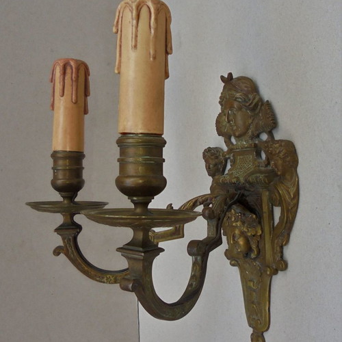 Pair of bronze antique two-light wall sconces, late 19th century
