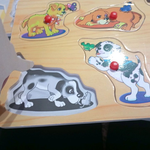 Wooden puzzle with puppies like new
