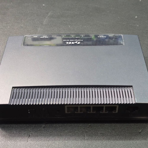 ZyXEL Prestige 660H-63 ADSL2+ 4-Port Gateway router used with power supply