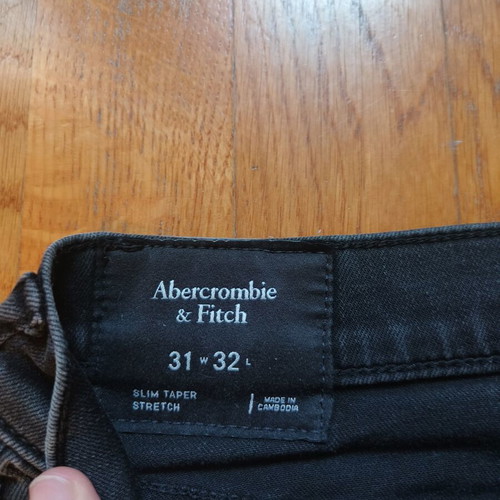 Abercrombie & Fitch black washed jeans used, stain on front, size S