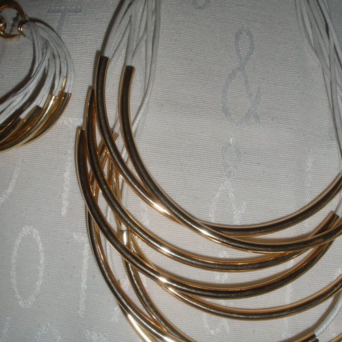 Women's jewelry set with gold-tone metal elements, boho-minimalist style