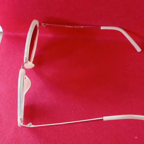 Sunglasses used, beige color